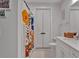 Bright bathroom with colorful shower curtain and white vanity at 6890 Peachtree Dunwoody Rd # 303, Atlanta, GA 30328