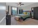 Comfortable bedroom with a ceiling fan and a window with natural light at 6890 Peachtree Dunwoody Rd # 303, Atlanta, GA 30328