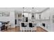 Contemporary kitchen with white cabinets, stainless steel appliances, and a kitchen island at 6890 Peachtree Dunwoody Rd # 303, Atlanta, GA 30328