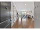 Inviting view into the living room with hardwood floors and comfortable seating at 6890 Peachtree Dunwoody Rd # 303, Atlanta, GA 30328