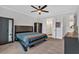 Spacious main bedroom features a ceiling fan, two closets and an ensuite bathroom at 6890 Peachtree Dunwoody Rd # 303, Atlanta, GA 30328