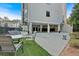 Outdoor pool area with lounge chairs and lush landscaping at 6890 Peachtree Dunwoody Rd # 303, Atlanta, GA 30328