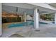 Outdoor pool area with lounge chairs and lush landscaping at 6890 Peachtree Dunwoody Rd # 303, Atlanta, GA 30328