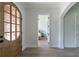 Light-filled entryway offering a view into a bedroom beyond at 64 Telfair Ct, Acworth, GA 30101