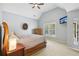 Bedroom with vaulted ceiling, neutral walls, and ample natural light, creating a serene retreat at 3950 Stanford Dr, Cumming, GA 30041