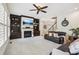 Relaxing living room featuring a fireplace, custom built-ins, and comfortable seating at 3950 Stanford Dr, Cumming, GA 30041