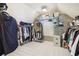Large walk-in closet with metal shelving and ample storage space at 3950 Stanford Dr, Cumming, GA 30041
