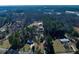 Aerial view of property showing house and surrounding land at 8404 Majors Rd, Cumming, GA 30041