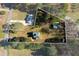 Aerial view of property showing house and surrounding land at 8404 Majors Rd, Cumming, GA 30041