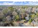 Aerial view of neighborhood with mature trees at 1055 Downing Ne Ct, Marietta, GA 30068