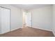 Spacious bedroom with carpet flooring and double door closet at 1512 Pine Glen Cir, Decatur, GA 30035