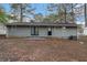 Gray house exterior with a patio and backyard at 1512 Pine Glen Cir, Decatur, GA 30035