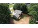 Aerial view of a house and backyard with trees at 520 Mountainview Dr, Covington, GA 30016