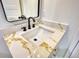 Modern bathroom with quartz countertop and black matte faucet at 520 Mountainview Dr, Covington, GA 30016