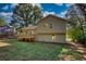 Two story house with wooden deck and green siding at 520 Mountainview Dr, Covington, GA 30016