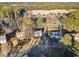 Aerial view of neighborhood with houses and trees at 718 Creek Nw Trl, Kennesaw, GA 30144