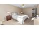 Spacious bedroom with natural light and a large bed at 718 Creek Nw Trl, Kennesaw, GA 30144