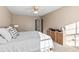 Comfortable bedroom with a king-size bed and access to a bathroom at 718 Creek Nw Trl, Kennesaw, GA 30144