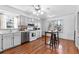 Modern kitchen with stainless steel appliances and light gray cabinets at 718 Creek Nw Trl, Kennesaw, GA 30144