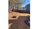 Large backyard with basketball hoop and wood fence at 3954 Riverside Pkwy, Decatur, GA 30034