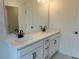 Bright bathroom with a double vanity, quartz countertop, and modern black fixtures at 405 Carrera Ln, Acworth, GA 30102