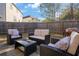 Private backyard patio with seating area and grill at 1252 Thomas Daniel Way, Lawrenceville, GA 30045