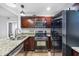 Modern kitchen with stainless steel appliances, granite countertops, and ample cabinet space at 2240 Cheshire Bridge Rd # 205, Atlanta, GA 30324