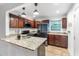 Modern kitchen featuring granite countertops, stainless steel appliances, ample cabinet space, and stylish lighting at 2240 Cheshire Bridge Rd # 205, Atlanta, GA 30324