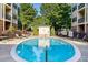 Community pool features a pristine pool and lounge chairs perfect for relaxation at 2240 Cheshire Bridge Rd # 205, Atlanta, GA 30324