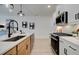 Kitchen view showcasing stainless steel appliances and a large center island at 401 Carrera Ln, Acworth, GA 30102