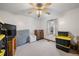 Simple bedroom with ceiling fan, neutral walls, and ample floor space at 4036 Evelyn Dr, Powder Springs, GA 30127