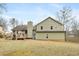 Exterior view of house with deck and yard at 4036 Evelyn Dr, Powder Springs, GA 30127