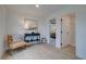 Bright hallway with a desk and chair, leading to a bedroom with a ceiling fan at 417 Carrera Ln, Acworth, GA 30102