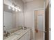 Guest bathroom with granite countertop and single sink vanity at 437 Cherry Tree Ln, Marietta, GA 30066