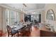 Formal dining room with hardwood floors, chandelier, and views to sitting area at 437 Cherry Tree Ln, Marietta, GA 30066