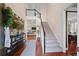 Two-story foyer with hardwood floors, a staircase, and decorative console table at 437 Cherry Tree Ln, Marietta, GA 30066