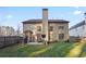 Two-story house exterior showcasing backyard patio and lawn at 437 Cherry Tree Ln, Marietta, GA 30066