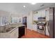 Modern kitchen with granite countertops and stainless steel appliances at 437 Cherry Tree Ln, Marietta, GA 30066