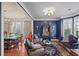 Sitting room with dining area, bay window, comfortable seating, and dark blue walls at 437 Cherry Tree Ln, Marietta, GA 30066