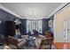 Sitting room features a bay window, comfortable seating, and a dark blue wall at 437 Cherry Tree Ln, Marietta, GA 30066