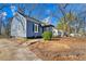 House exterior showcasing blue siding and landscaping at 540 Hamilton E Holmes Nw Dr, Atlanta, GA 30318