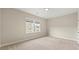 Spacious bedroom with neutral walls and carpeting at 4173 Valtek Ct, Suwanee, GA 30024