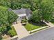 Aerial view of house and surrounding area at 630 Birnamwood Dr, Suwanee, GA 30024