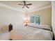 Bedroom with two twin beds and a view of the backyard at 630 Birnamwood Dr, Suwanee, GA 30024