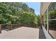 Spacious deck overlooking wooded area at 630 Birnamwood Dr, Suwanee, GA 30024