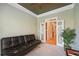 Home office with built-in shelving and French doors at 630 Birnamwood Dr, Suwanee, GA 30024