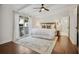 Spacious bedroom with hardwood floors and access to a deck at 976 Cardova Ne Dr, Atlanta, GA 30324