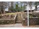 Stone steps leading up a terraced hillside garden at 976 Cardova Ne Dr, Atlanta, GA 30324