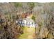 Aerial view of home showcasing large backyard and lake view at 1126 Wedgefield Dr, Marietta, GA 30064