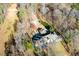 Aerial view of home with large backyard and wooded area at 1126 Wedgefield Dr, Marietta, GA 30064